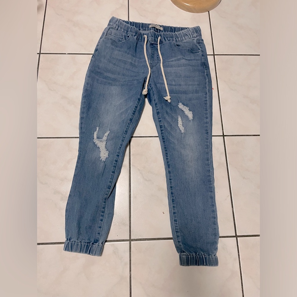 Faded ripped drawstring jogger jeans